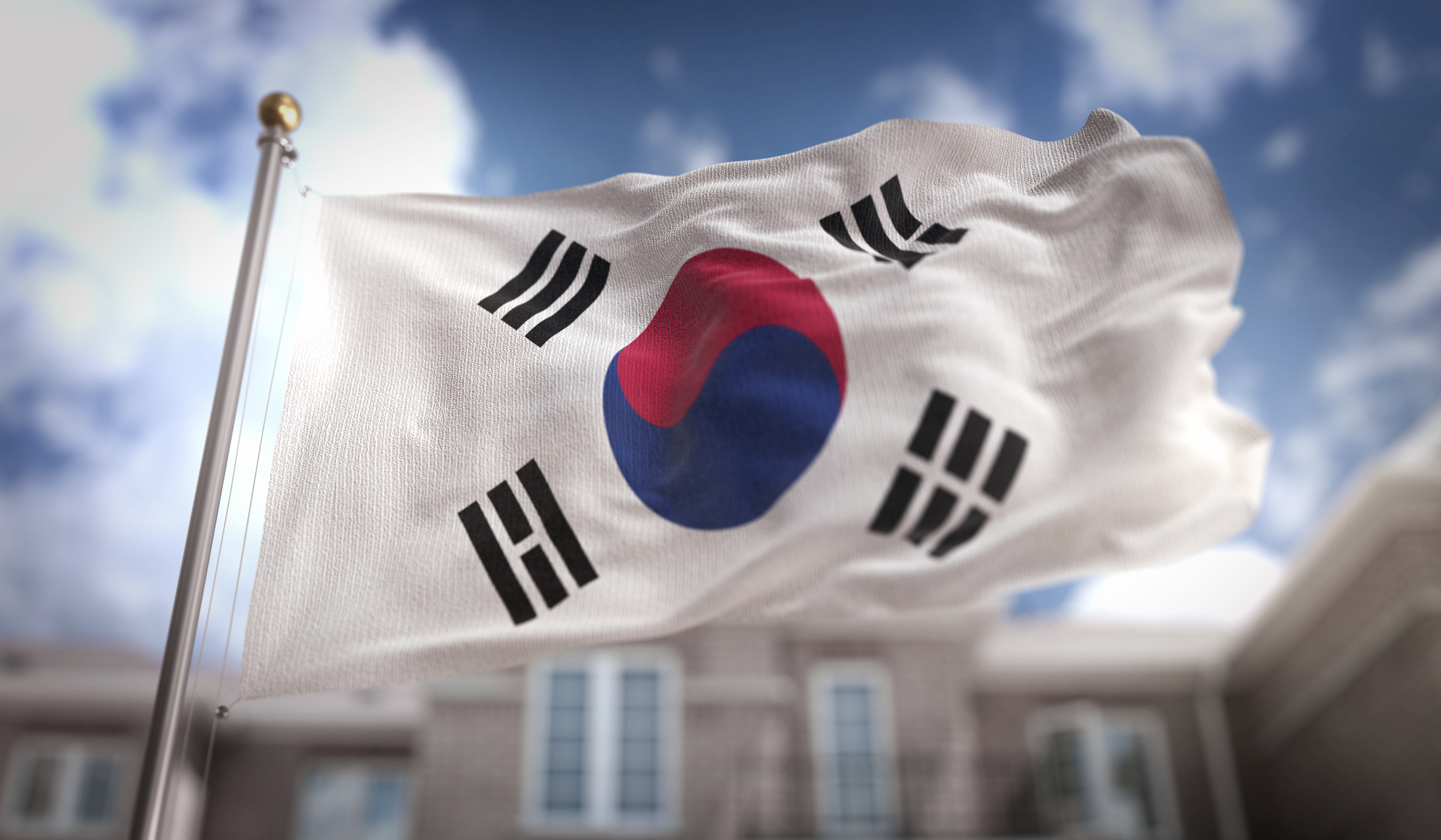 south-korea-flag-3d-rendering-blue-sky-building-background.jpg